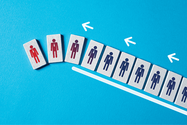 Blocks with human figures on top with arrows pointing on a light blue background.