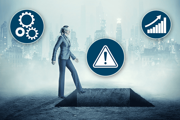 Blindfolded business woman unknowingly stepping into square hole in ground.