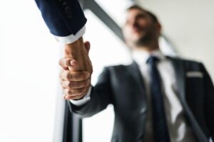 photo of two businessmen shaking hands