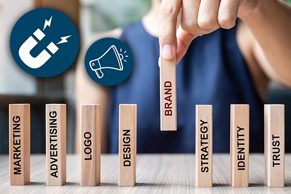 Blocks with marketing words on them. person selecting the brand block