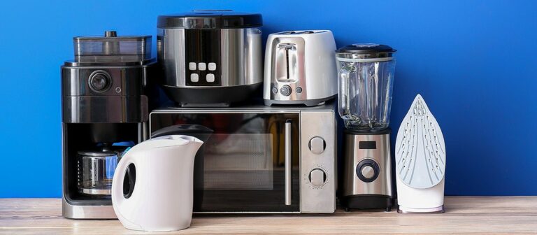 Various kitchen appliances including iron, toaster oven, blender, coffee maker, water filter, and more.