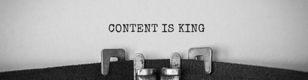 Image with the words "content is king" written.