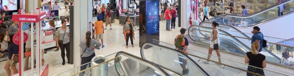 New York - September 10, 2016: Macy's department store interior, cosmetics area with escalators in New York. Macy is the largest U.S. department store company.