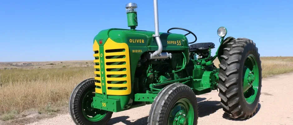 Green Oliver tractor on dirt path