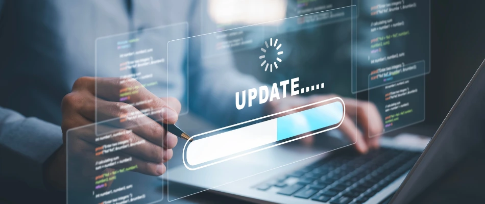 Man using laptop with Update loading bar for Google algorithm