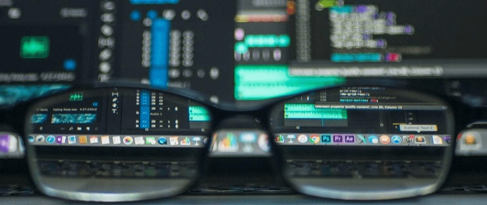 glasses looking at web development project