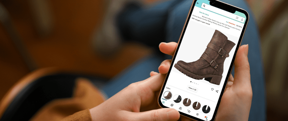 hand holding phone with amazon listing on the screen