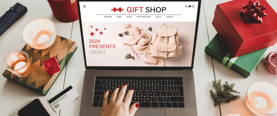 person shopping for 2024 holiday presents online surrounded by presents and candles