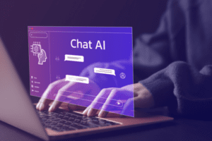 typing on laptop with AI chatbot window on screen