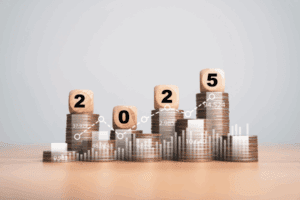 2025 Year on the top of coins stacking for financial plan