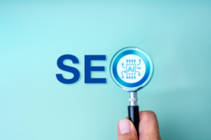 SEO optimization, search engine marketing, with Artificial intelligence assistant tools technology concept. AI chip focused in magnifying glass lens in people hand, with text SEO, on blue background.