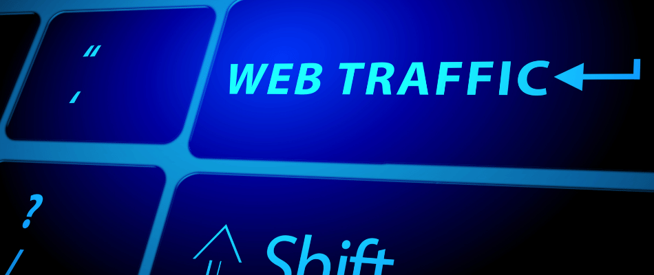 Close up of computer keyboard with Web Traffic printed on one key